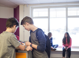 Normal_teenagers-interacting-in-a-classroom-setting-with-2025-04-05-03-30-51-utc